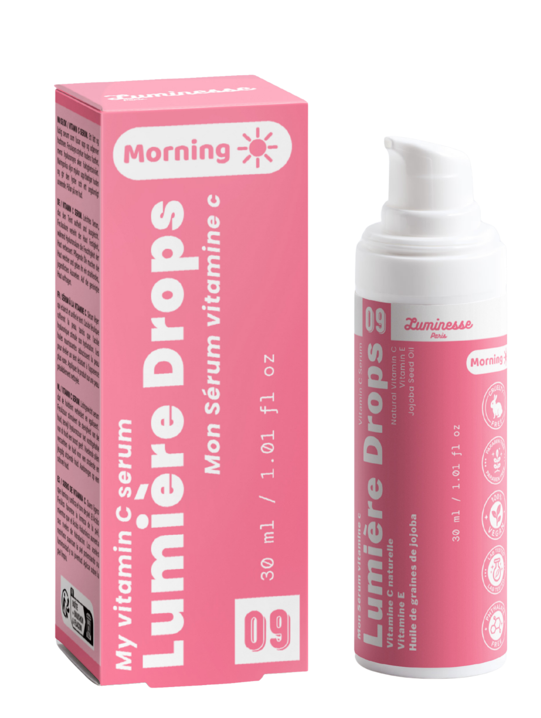 Packshot de Lumière Drops n°09 de Luminesse Paris avec son étui rose et son flacon pompe blanc de 30 ml. Le produit et la boîte sont présentés côte à côte sur fond transparent ; la mention Morning ainsi que les références à la vitamine C, vitamine E et huile de graines de jojoba sont visibles.